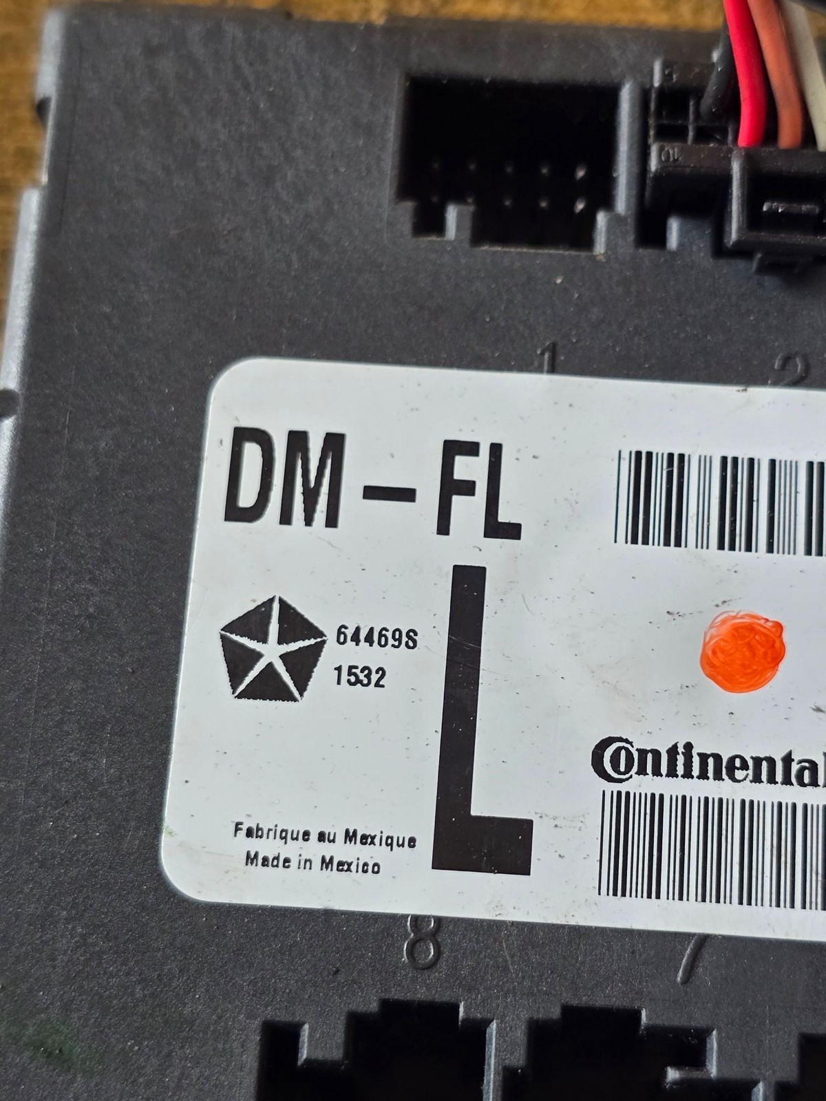 Continental DM-FL Door Control Unit Module 05026861AE Front Left Chrysler Black