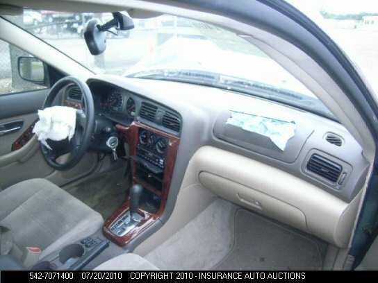 04 LEGACY CHASSIS ECM TRANSMISSION UNDER CENTER DASH CANADA EMISSIONS 2.5L SUS