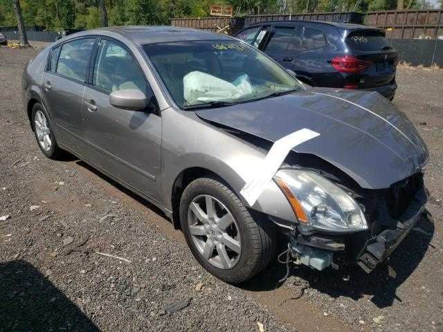 2004 Nissan Maxima Engine ECM Electronic Control Module Behind Glove OEM 754010